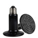 Black ceramic heating element with spiral design on a white background