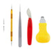 Set of small tools including tweezers and a scalpel on a white background
