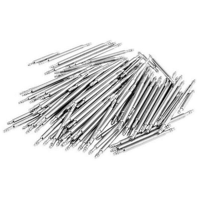 Collection of metal needles on a white background