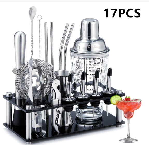 Set of 17 cocktail-making tools on a stand with a glass of red cocktail and lime garnish.