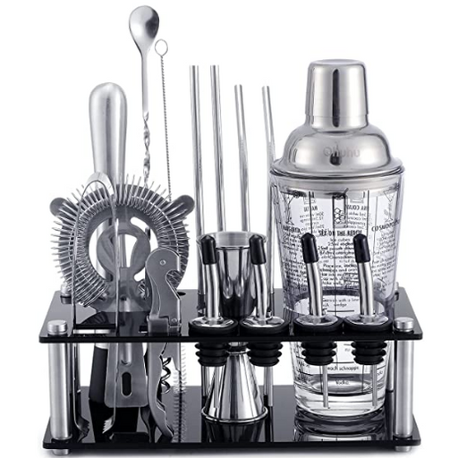 Set of cocktail-making tools including a shaker, jigger, and strainers on a stand.