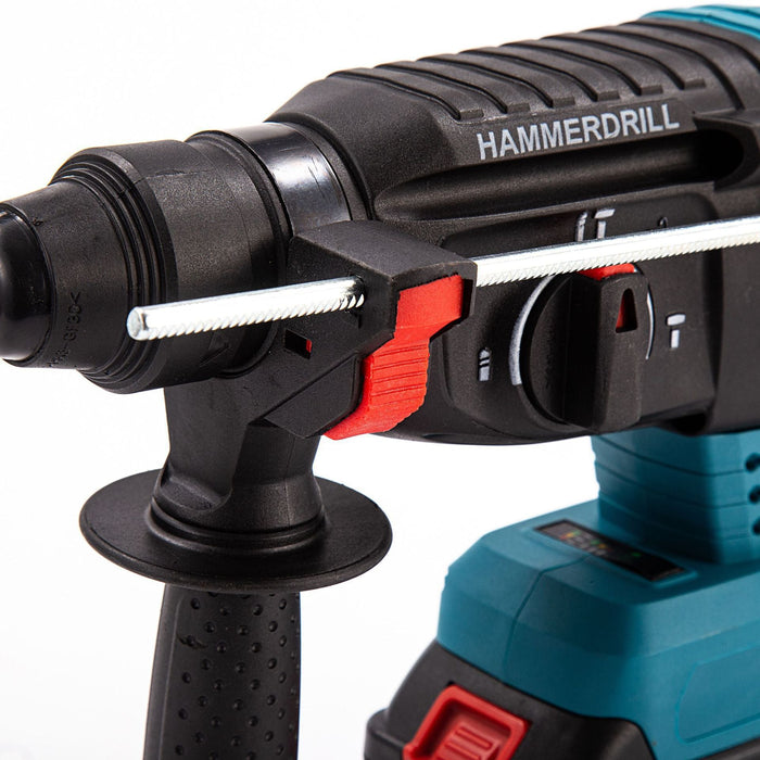 Close-up of a hammer drill with focus on the drill bit and brand name.