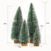 Set of three miniature Christmas trees with measurements on a white background