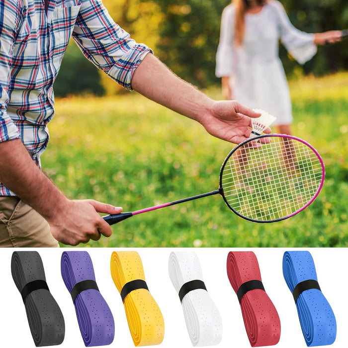 Person holding a badminton racket with a blurred background of people playing badminton.