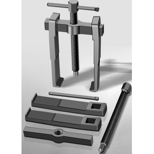 Metal puller tool with components on a gray background
