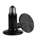 Black ceramic heating element with spiral design on a white background