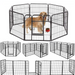 Dog inside a black metal pet playpen with multiple panels on a white background