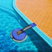Pool ramp on the edge of a swimming pool with tiled deck.