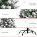 Decorative Christmas tree with snow-dipped branches, pinecones, red berries, and a sturdy base on a white background.