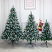 Three decorated Christmas trees in a room with a 'Live Laugh Love' poster on the wall.