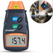 Digital tachometer with close-up inset showing use on a machine.