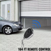 Garage door opener remote control with car and garage door in the background