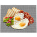 Breakfast setting with eggs, bacon, toast, and salad on a black mesh mat.