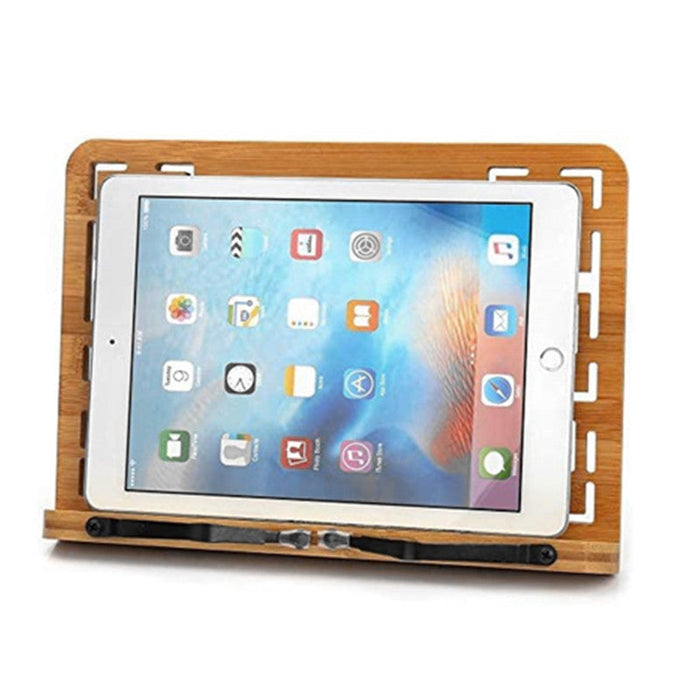 Tablet in a wooden stand on a white background