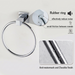 A wall-mounted chrome towel ring with callout graphics and inset detail shots. The image includes text noting a rubber ring that reduces noise and avoids metal friction, plus a close-up of water droplets showing a durable, anti-water finish.
