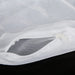 Close-up of white mesh fabric with a black background