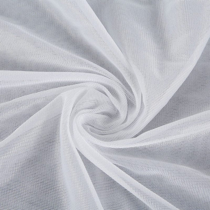 Close-up of white fabric with a subtle pattern