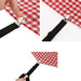 Red and white checkered tablecloth with black suspenders on a white background