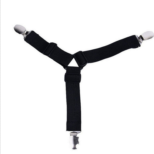 Black suspenders with silver clips on a white background