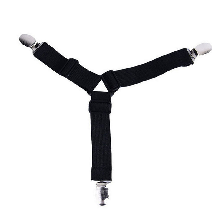 Black suspenders with silver clips on a white background