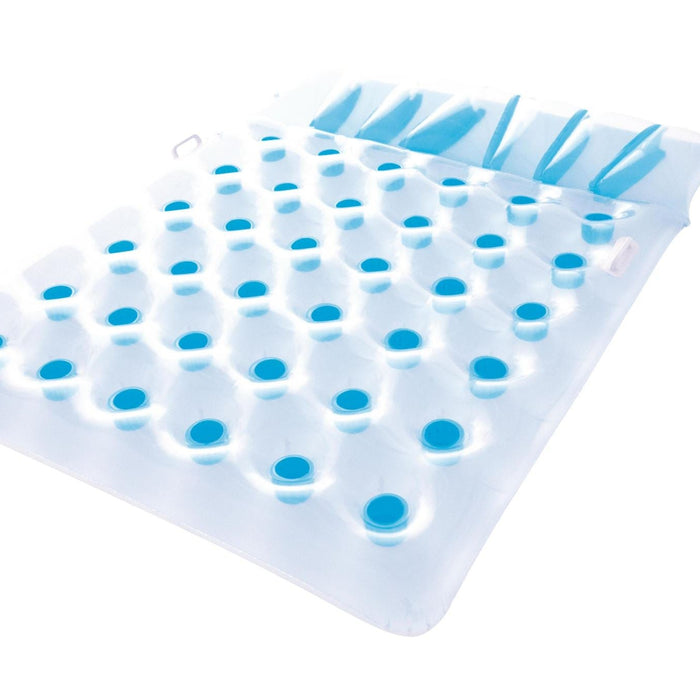 Silicone mold with blue dots on a white background