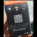 Back of a device with QR code and text for OBD app download