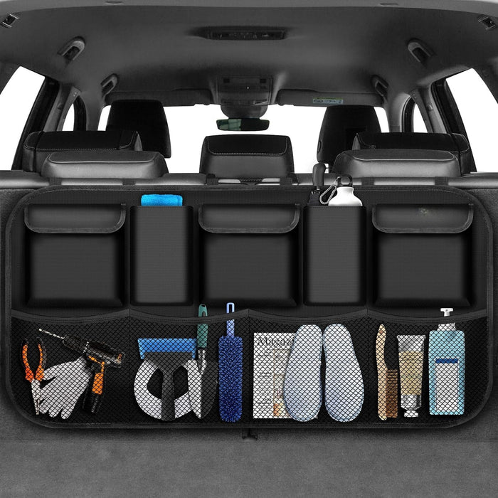 Car trunk with organizer holding various items