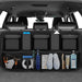 Car trunk with organizer holding various items