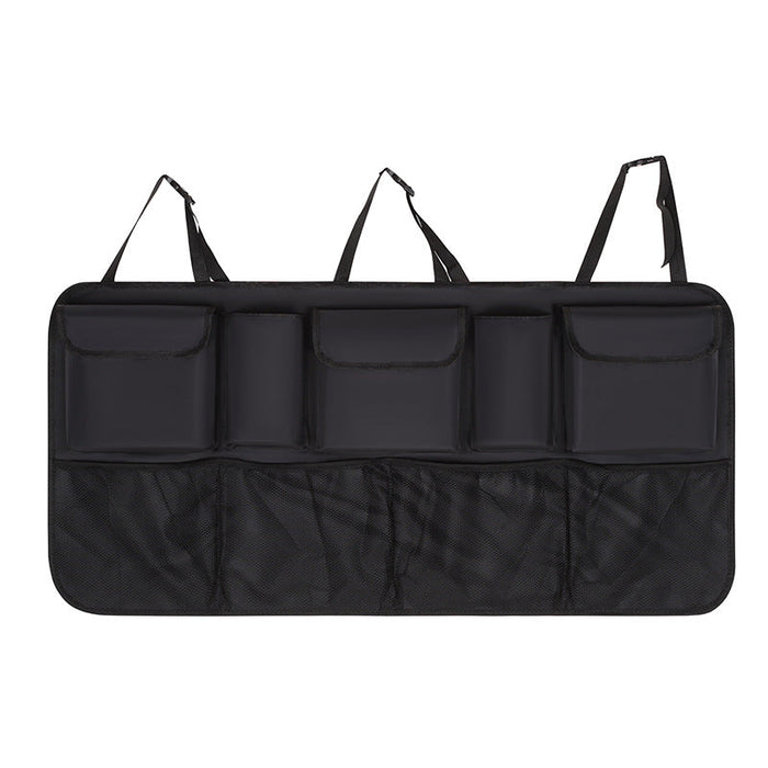 Black car organizer with multiple pockets on a white background
