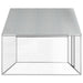 Metallic square table with textured surface on a white background