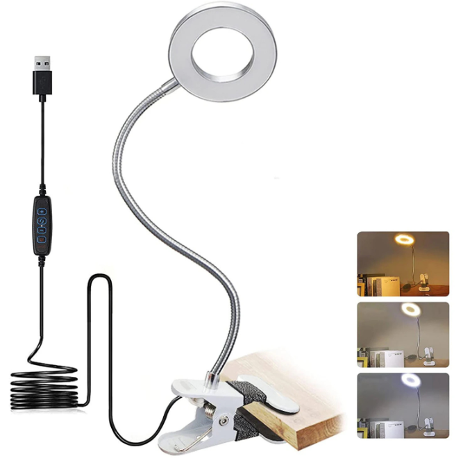 Ring light with flexible arm and clip on a white background