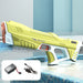 Yellow Electric Water Gun  with battery and cable on a pool deck