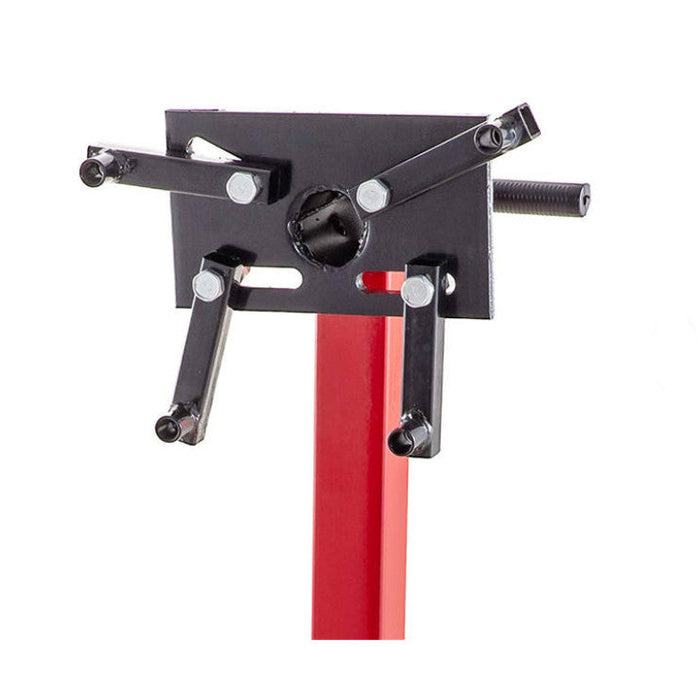 Black metal stand with red support on a white background