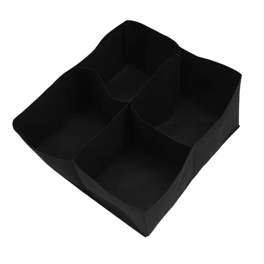 Black car organizer with compartments on a white background