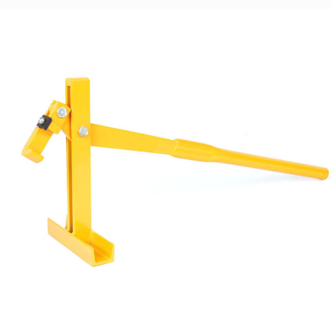 Yellow metal tool on a white background