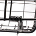 Close-up of a metal trap with a spring mechanism on a white background