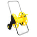 Yellow garden hose reel with black handle on a white background