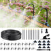 Garden irrigation system with hose, nozzles, and connectors against a blurred garden background.