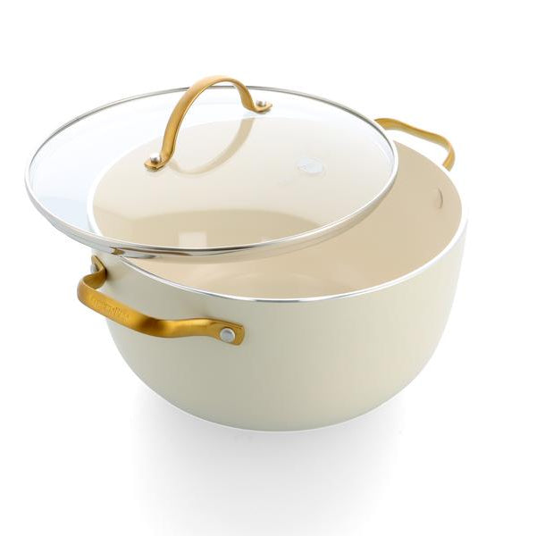 Cream-colored ceramic pot with gold handles on a white background
