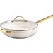 White wok with gold handle and trim on a white background