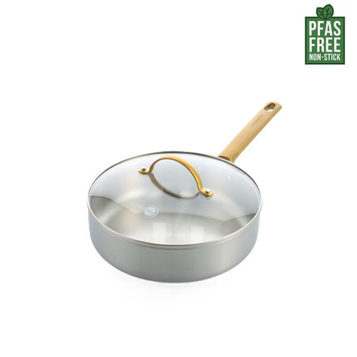 Stainless steel frying pan with wooden handle on a white background, featuring a PFAS-free label.