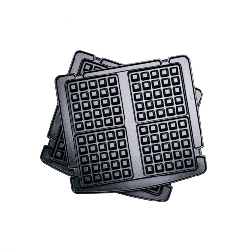 Stack of waffle iron grids on a white background
