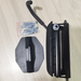 Motorcycle mirror assembly with mounting hardware on a light wooden surface