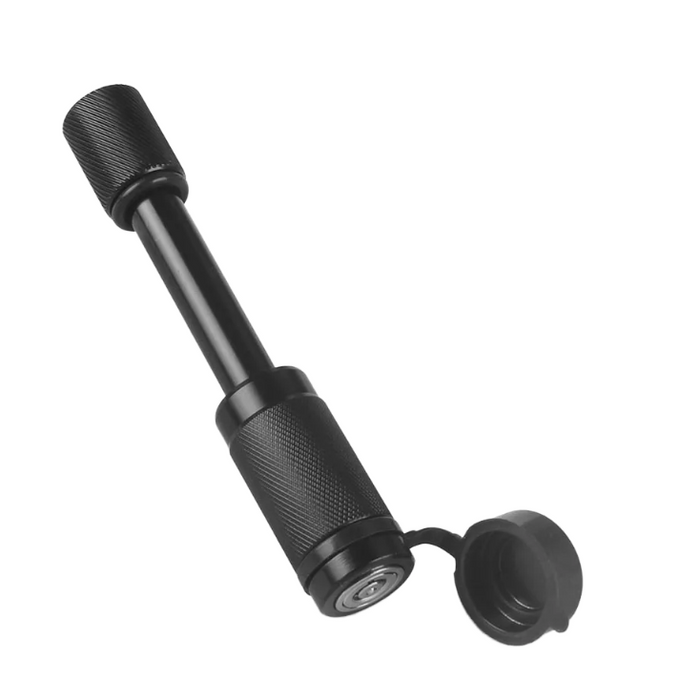 Black metal tool with adjustable component on a white background