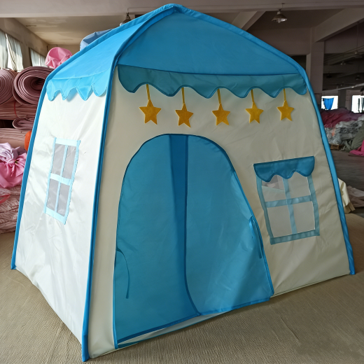 Children's play tent with blue and white design, featuring star decorations on a carpeted floor.