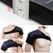 Black shoulder brace with measurement details and usage on a person