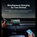 Car dashboard with a built-in 25W car charger charging two devices.