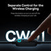 Hand pressing a button on a wireless charging cable with text indicating control for wireless charging.