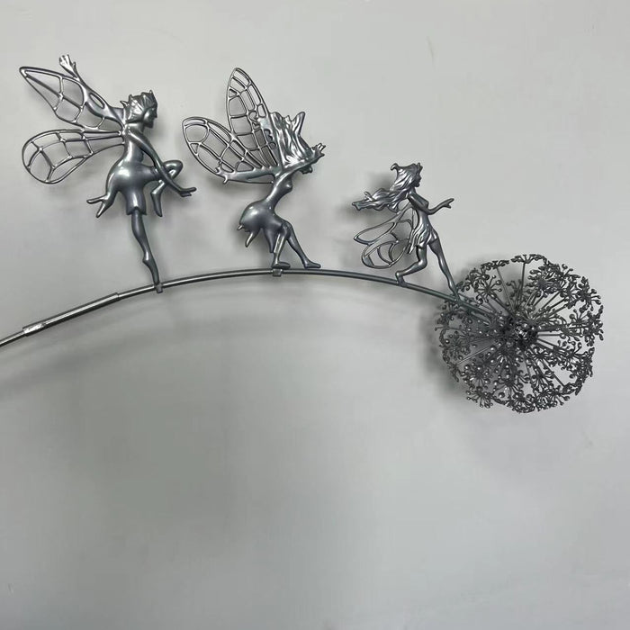 Silver fairy-themed hair accessory on a white background