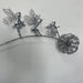 Silver fairy-themed hair accessory on a white background